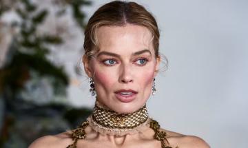Margot Robbie sparks cosmetic surgery speculation after paris fashion appearance