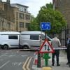 Man charged in synagogue fire amid terror investigation