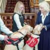 Queen Camilla hosts medical dogs trained to detect serious diseases