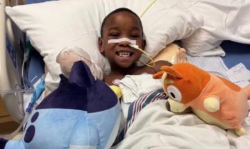 Michigan boy returns home after losing both arms in pit bull attack