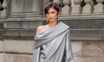 Zendaya stuns in silver Vuitton mini dress and $22,800 Tiffany earrings at Cruise 2027 show