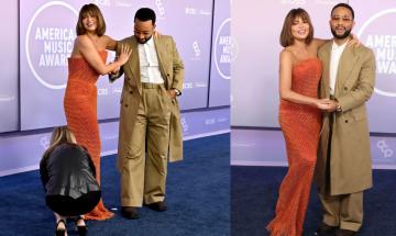 Chrissy Teigen laughs off wardrobe malfunction as John Legend saves the day