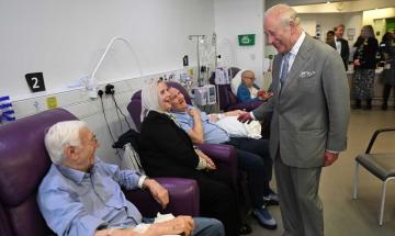 King Charles visits Macmillan Cancer Centre in York and plants a rose in its newly created garden