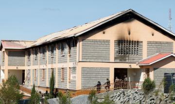 Eight students arrested over suspected arson attack at Kenya girls school that killed 16