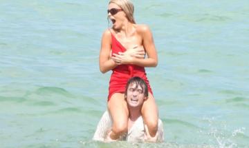 Brooks Nader suffers wardrobe malfunction at Sports Illustrated Swim Week event