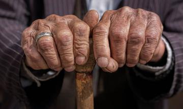 Son jailed after forcing elderly father into ‘blackened room’ and stealing life savings