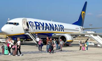 Ryanair under UK investigation for charging parents to sit next to their children