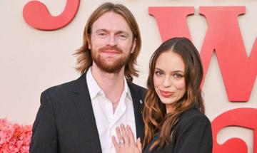 Finneas reveals how he proposed to Claudia Sulewski with helicopter