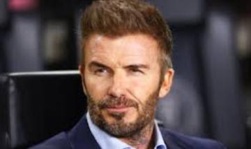 David Beckham honoured on Walk of Fame as Brooklyn stays away