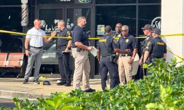 Alabama father killed in front of family at barbershop