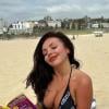 Jesy Nelson showcases toned abs in throwback holiday snaps