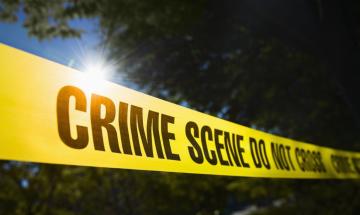 Illinois officer faces murder charge in roommate's fatal shooting