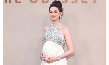 Anne Hathaway receives handmade baby gift during Odyssey interview