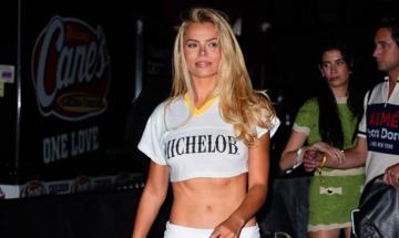 Brooks Nader wears white miniskirt at New York World Cup final event