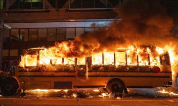 Man arrested after setting Times Square bus on fire