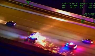 Florida police shoot at murder suspect following car pursuit