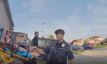 Body cam video shows Kim Scott cursing at police officers