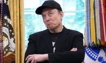 Elon Musk clashes with journalist over public popularity