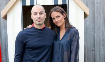 Katie Holmes and artist Jason Bard Yarmosky pose together during Hamptons outing