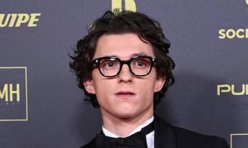 Tom Holland jokes some of his movies are 's---' during candid interview